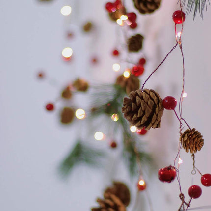 Christmas Pinecone Garlands with Lights, Vocal Metal Jingle Bell, Xmas Red Berry and Pine Leaf, Holiday Garland 10ft 30LEDs Battery Operated String Lights with Timer Flicker Options Remote Control
