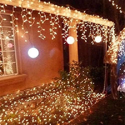 Dopheuor Icicle Fairy Lights 400LED 32.8ft 75Drops 8 Modes Waterproof String Lights for Outdoor Eaves Curtain Christmas Trees Party Decor(Warm White)