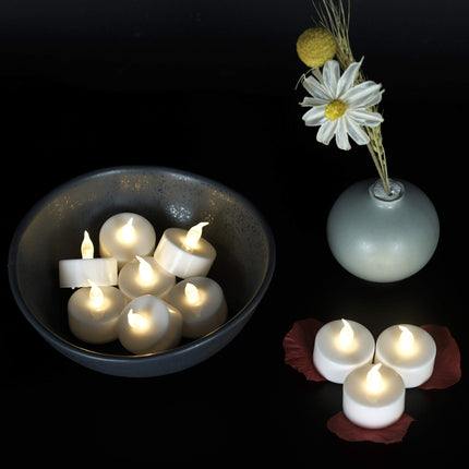 JUNPEI Battery Operated Powered Tea Lights : Realistic Tea Lights Flickering Candles Holiday Suitable for Wedding Parties Festival Celebration Long Lasting (100pack Warm White)