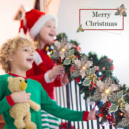 Jexine 2 Pcs Christmas Glitter Artificial Poinsettia Garland 6.5 ft 10 LEDs Faux Flower Xmas String Lights Poinsettia Garland with Lights Gold Berries Holly Leaves for Indoor Outdoor Decor