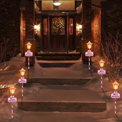 Christmas Pathway Lights Outdoor - 4 Pack Flickering Flame Solar Candy Stake Lights Waterproof Solar Landscape Lights for Christmas Garden, Patio, Yard Driveway Decoration(White)