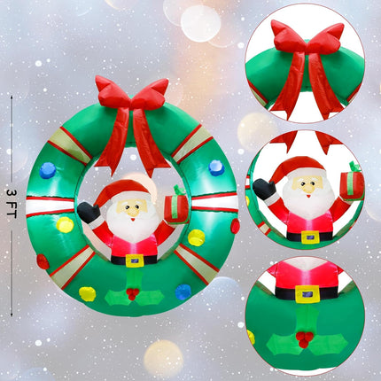 ATDAWN 3ft Christmas Inflatables Blow Up Yard Decorations, Inflatable Santa Claus Sitting on Christmas Wreath Outdoor Decoration, Blow Up Hanging Christmas Wreath for Christmas Yard Garden Decorations