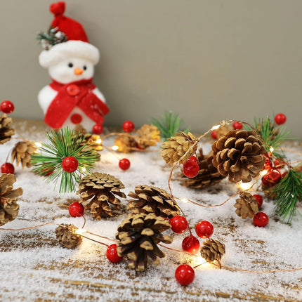 Christmas Garland with Lights, 6.6FT Pinecones Christmas String Lights with Red Berries, Bells & Needles, 20 LED Battery Operated Prelit Garland for Indoor/Outdoor Christmas Decorations (Warm White)