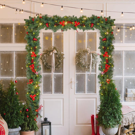 Dolicer 9 FT Artificial Christmas Garland, Christmas Garland with 50 LED Lights, Garlands for Decoration Christmas with Red Berries Christmas Balls Bowknots for Xmas Mantle Table Indoor Outdoor Decor