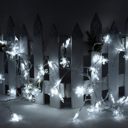 Holiday Essence Snowflake Christmas Lights, 50 Cool White LED 8 Modes 25 Ft Indoor Outdoor Snowflakes String Lights Set Battery Operated